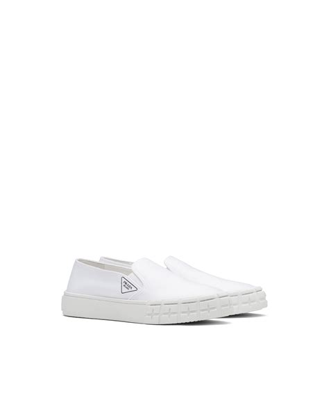 prada cap-toe gabardine slip on sneakers|White Cotton gabardine Wheel slip.